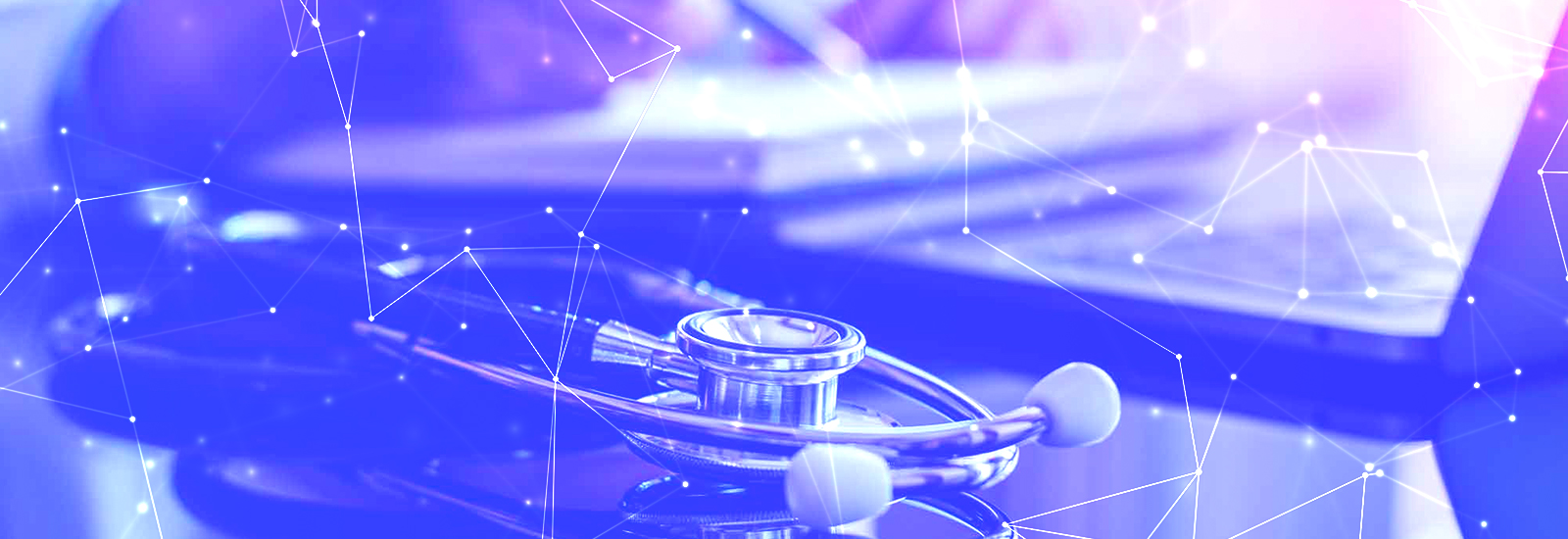 A stethoscope rests on a reflective surface with a person using a laptop in the background, overlaid with digital network lines and points.