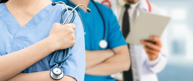 Nurses and doctor in a row